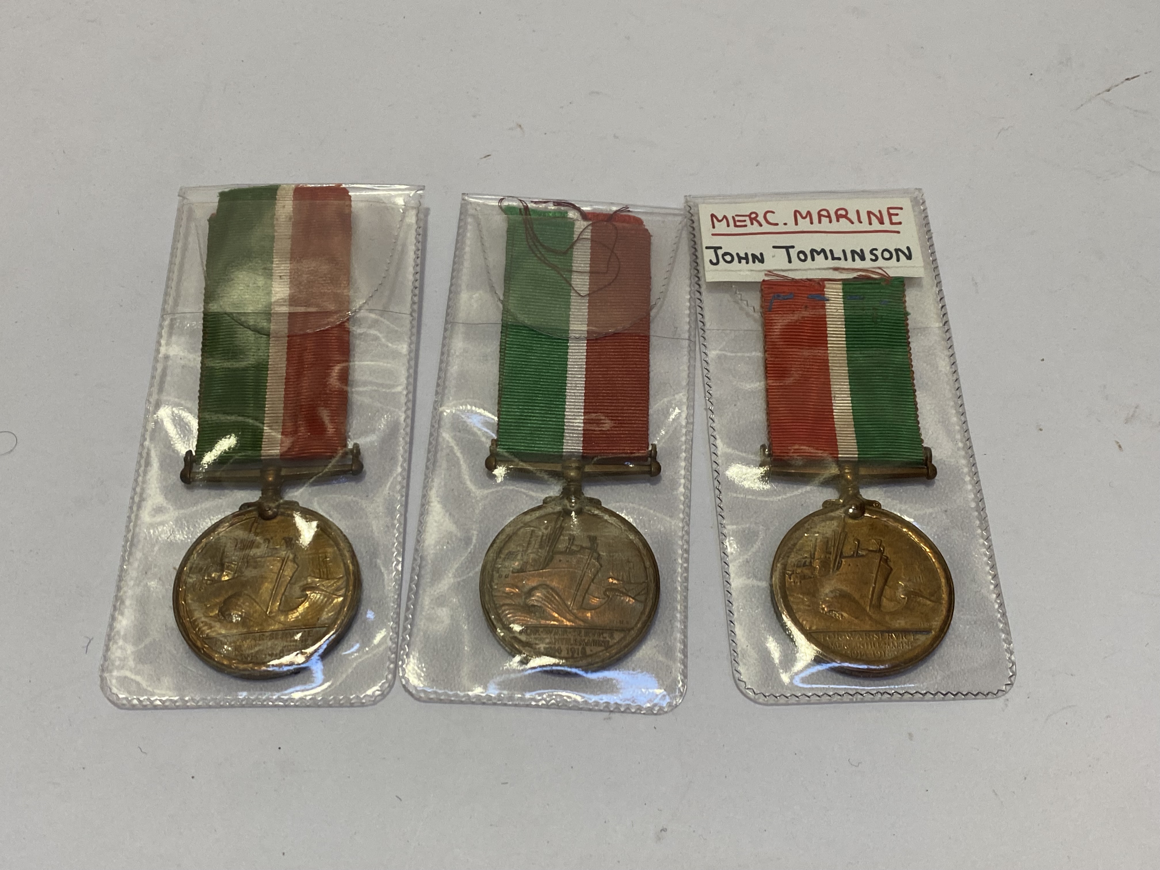 Mercantile Marine War Medal (3), (JOHN TOMLINSON, JOHN TRAYNOR, NEIL LIVINGSTON)