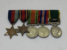 WWII and Territorial Group. 1939-45 Star, Burma Star, Defence Medal, War Medal and Territorial