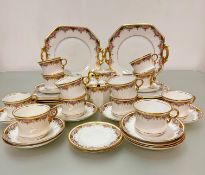 A forty three piece Royal Stafford china tea service including two cake plates, a milk jug, sugar