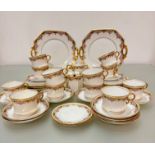 A forty three piece Royal Stafford china tea service including two cake plates, a milk jug, sugar