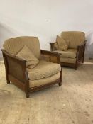 Ercol, a pair of late 20th century stained elm bergere armchair, upholstered in chinille fabric,