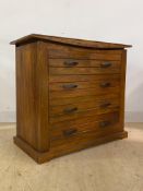 A modern hardwood chest fitted with two short and three long graduated drawers (A/F) H91cm,