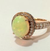 A Le Vian 14 ct strawberry gold Neapolitan opal and diamond dress ring, the oval cabuchon opal