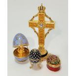 A Faberge style cross with mounted with Russian crown, with crystal set centre mounted on faux pearl