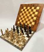 A marble chess board and a burr elm and sycamore chess board and a set of Don Quixote (h 11cm) and