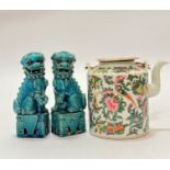 A pair of late 19th Century Chinese pottery Buddhistic lions with blue glaze (significant damage and