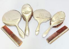 A Birmingham silver Edwardian gadroon rimmed three piece dressing table brush set including circular