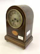 An Edwardian mahogany dome top mantel clock, the boxwood strung case inlaid with paterea, on a