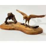 E Summers, Buzzard with Prey, elm, cherry and root wood, (15cm x 35cm x 14cm), signed verso and