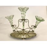 An early 20th century white metal table epergne with scalloped glass and green overlay flutes H29cm