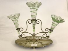 An early 20th century white metal table epergne with scalloped glass and green overlay flutes H29cm