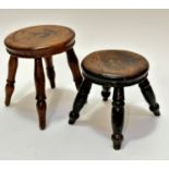 A 19thc treen circular stool with moulded edge, four turned tapered supports, (23cm x 20cm) and an