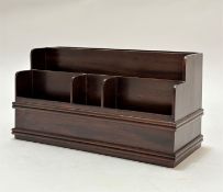 A modern Edwardian style mahogany five section stationary rack of stepped form on plinth base ( h-