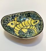 Maltese Interest: Elaine Malta triangular shaped fish pottery dish raised on pad feet, decorated