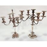 A near pair of Victorian style four branch Sheffield plated candelabra on knop and tapered stems
