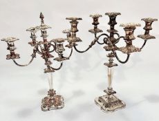 A near pair of Victorian style four branch Sheffield plated candelabra on knop and tapered stems