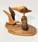 E Summers, Blacked Back Gulls, a treen carving (20cm x 28cm x 14cm), signed verso and dated 1999