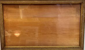 An Edwardian gilt composition frame with textured border (48cm x 77cm)