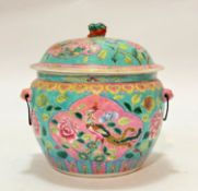 A Chinese turquoise and pink enamelled dish and cover with twin porcelain mask handles to side and