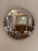 A Contemporary Venetian style wall mirror, with scalloped, bevelled, sectional and floral etched
