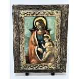 A Croatian treen panel with painted image of Madonna and infant Jesus, in plaster moulded framed