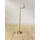 A modern brass finish lamp standard with articulated branch, H135cm