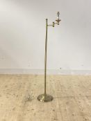 A modern brass finish lamp standard with articulated branch, H135cm