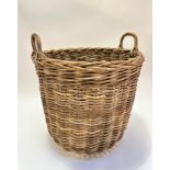 A handmade wicker two handled log basket of tapered cylinder design (53cm x 56cm), note please see