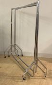 Shop Fitting: A Set of four chromium plated clothes rails, some moving on castors, largest 154cm x