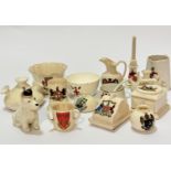 A collection of crested china including a Shelley china Scottie dog with crest of Redcar, a three