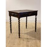 A late 19th century elm and oak side table, the frieze drawer and sides with applied green man