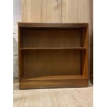 A mid 20th century teak open bookcase, fitted with one fixed shelf, (Alterations) H93cm, W100cm,