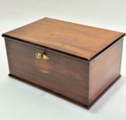 An Edwardian mahogany rectangular box, the top with moulded edge enclosing a plain interior complete