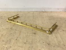 A cast brass fire curb, aperture measures 122cm x 41cm