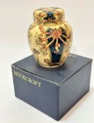 A Moorcroft ginger jar decorated with honeysuckle design, buff ground, signed verso WM and dated 9/