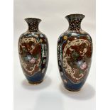 A pair of Chinese cloisonne baluster vases decorated with three claw dragon design and and