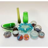 A collection of art glass including four Caithness glass paperweights, four Millefiori cased glass