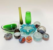 A collection of art glass including four Caithness glass paperweights, four Millefiori cased glass