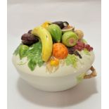 An Italian Dipinto Mano china tureen and cover with encrusted fruit including bananas, quinces,