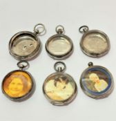 A collection of six various silver pocket watch cases, used as photograph mounts, (largest d 5cm,