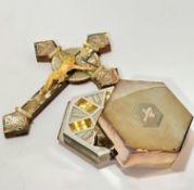 A Jerusalem olive wood mother of pearl and red foil mounted cross with plastic figure of Christ, (