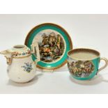 A Pratt ware cup and saucer, decorated with transfer printed cattle and washerwoman scene, saucer