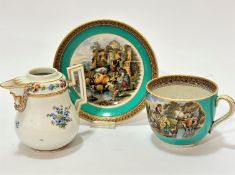 A Pratt ware cup and saucer, decorated with transfer printed cattle and washerwoman scene, saucer