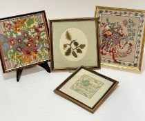 A collection of four various sewn work panels including running stitch, cross stitch and grospoint