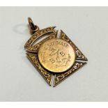 A 9ct gold presentation medallion with Boys Brigade, engraved inscription Sure and Steadfast Awarded