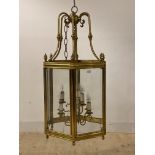 An Impressive and large gilt brass hall lantern of hexagonal outline, third quarter of the 20th