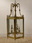 An Impressive and large gilt brass hall lantern of hexagonal outline, third quarter of the 20th