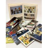 A plastic storage box containing a large collection of Moorcroft Collectors Club magazines,