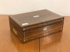 A 19th century rosewood and mother of pearl inlaid writing slope, with recessed carry handle to each