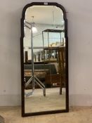 A 19th century mahogany framed wall hanging mirror, with shaped arch top, 123cm x 54cm